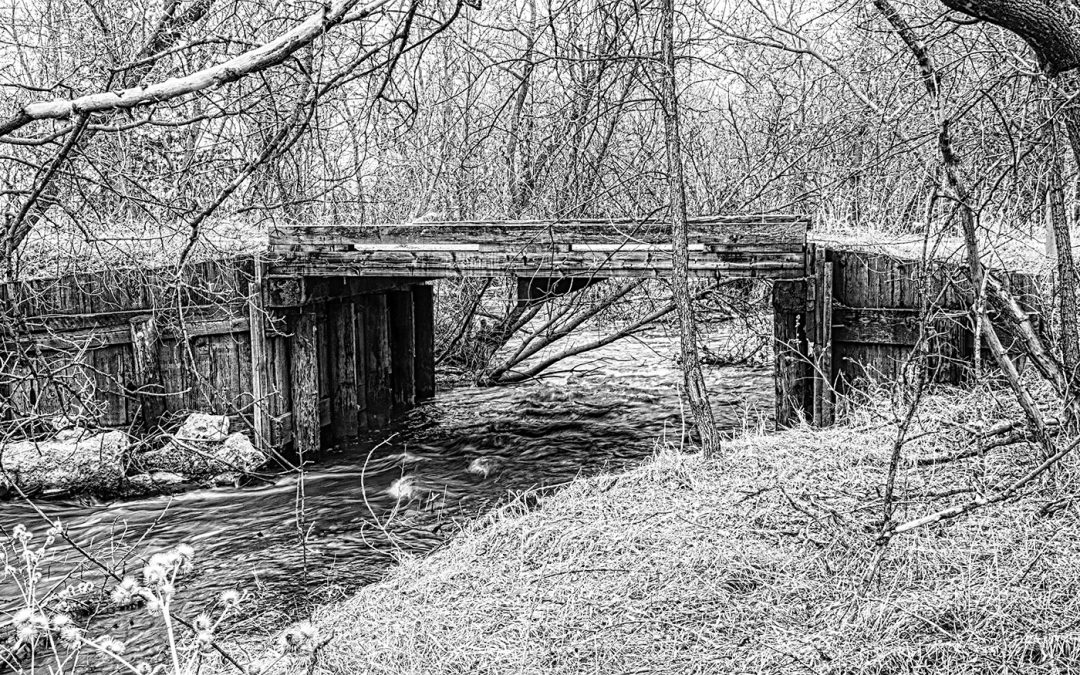 Wooden Bridge over rushing creek