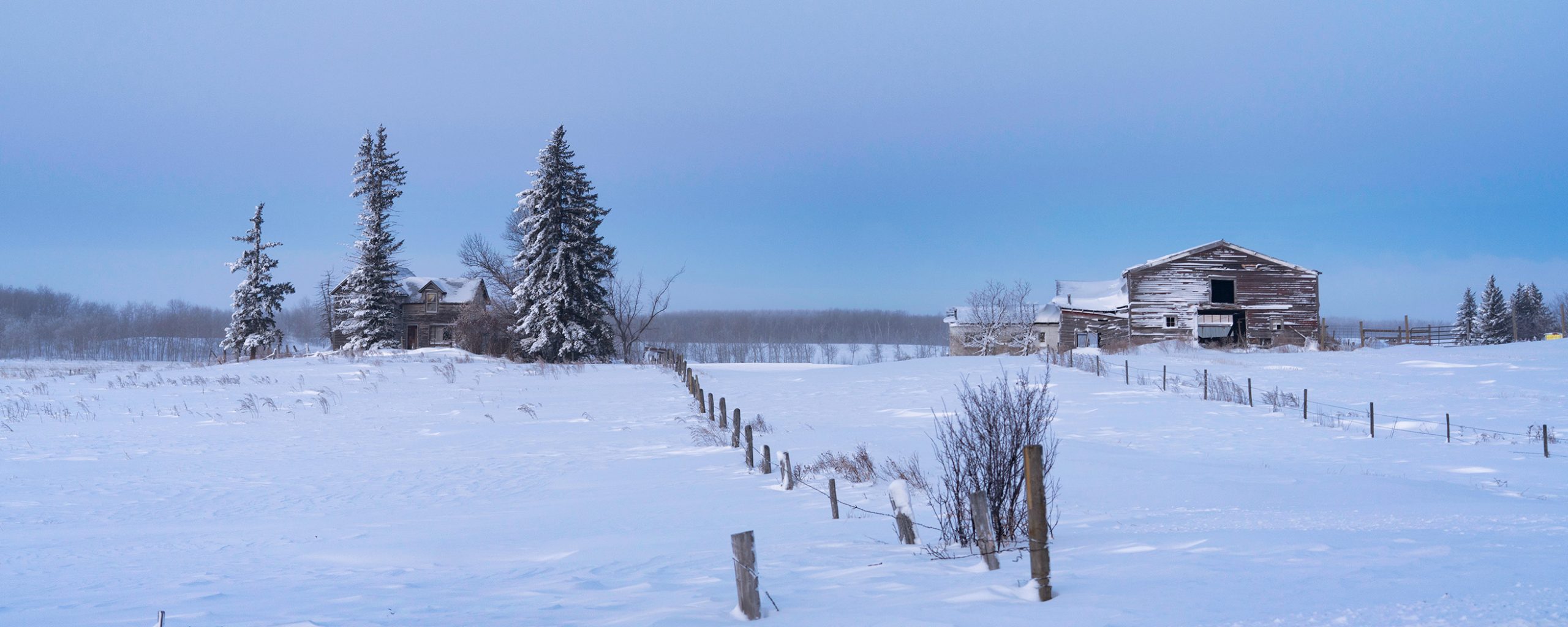 An Abandoned farm in the grips of Winter Calm and beautiful